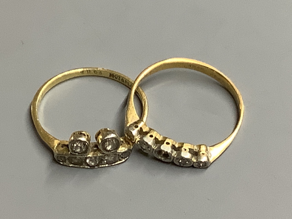 Three assorted 18ct and diamond set dress rings, gross 7.2 grams